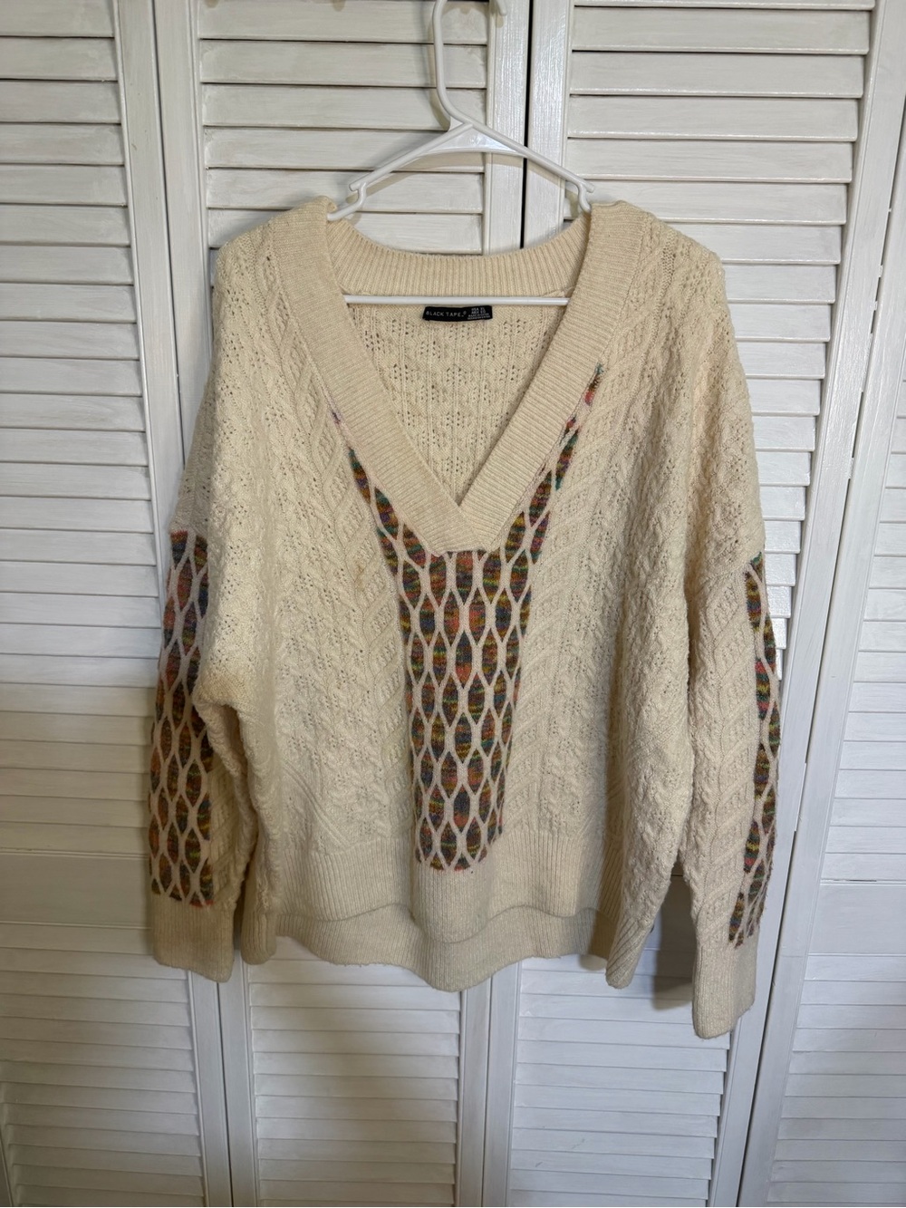 Black Label Cream V-Neck Sweater with Multicolor Diamond Panels